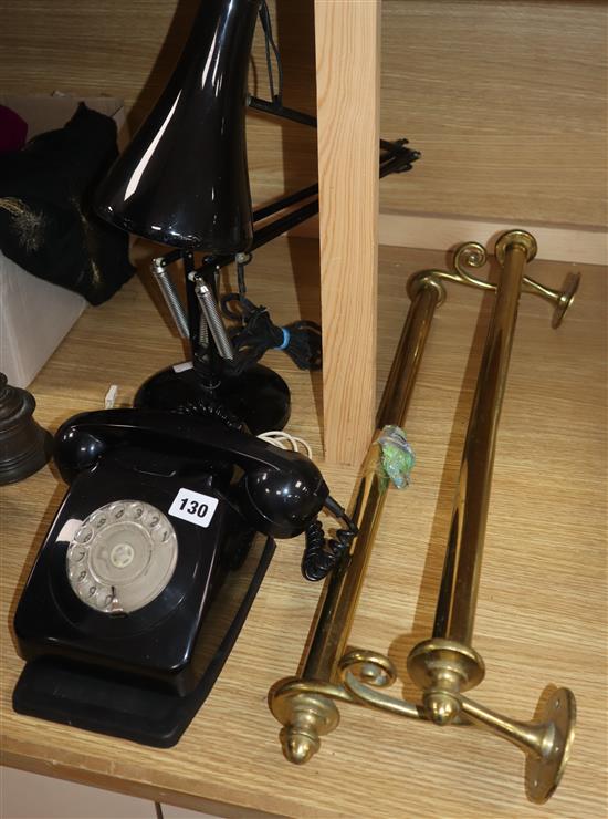 An angle poise lamp, a bakelite telephone and a brass towel rail (3)